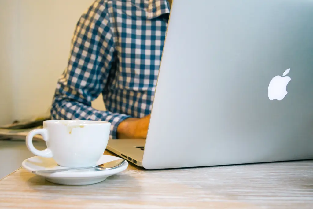 Person working from home on a laptop during the pandemic